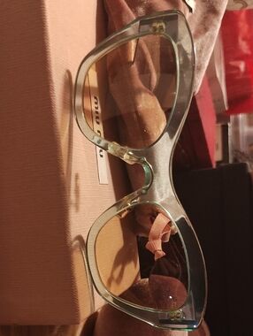 Miu Miu Translucent Light Green Cat-Eye Sunglasses with Gold Accents SMU M1 1p